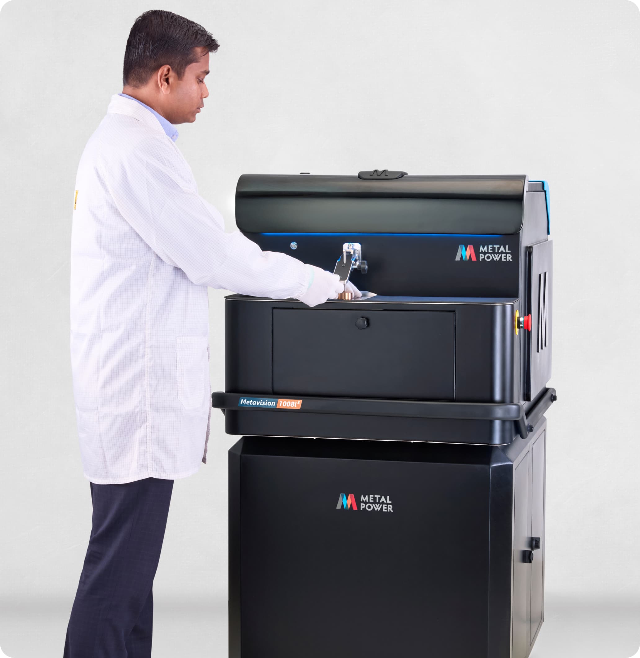 Technician using Metal Power optical emission spectrometer